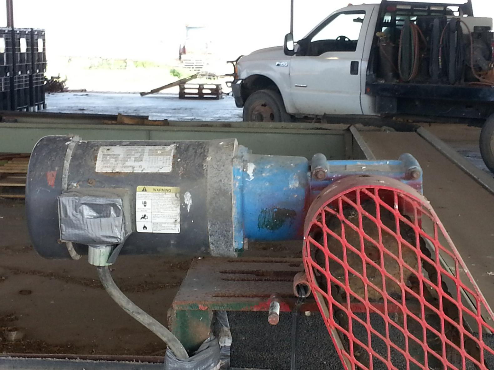 Precision laboratory scale with digital indicator being tested using certified calibration weights for accurate measurement