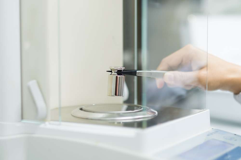 Industrial conveyor scale system with digital control panel used for certified scale calibration in an El Paso, TX facility