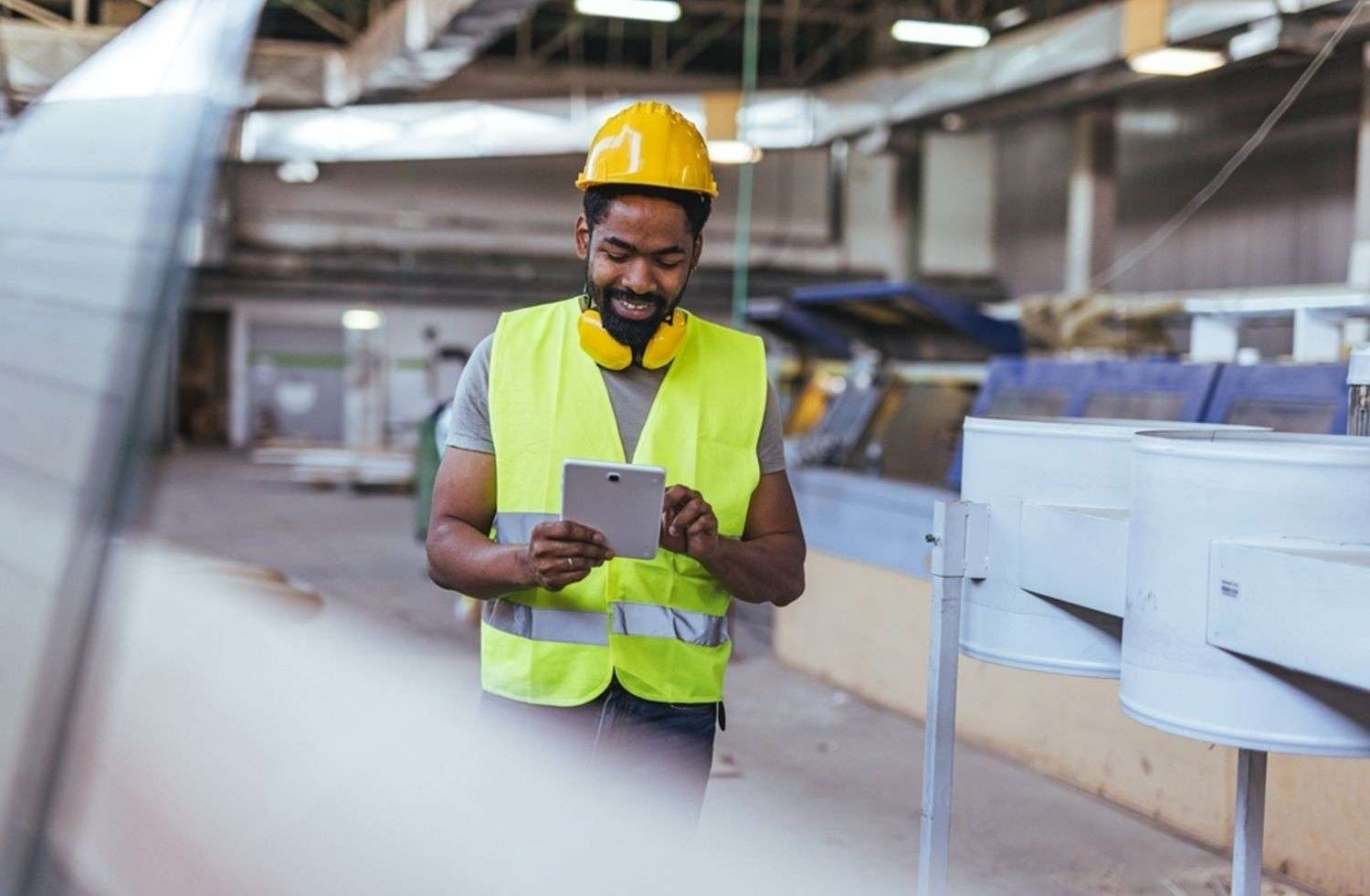 Precision laboratory scale with digital indicator being tested using certified calibration weights for accurate measurement